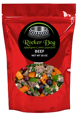 A red 16 oz. resealable bag of Rocker Dog's Beef dog food with visible chunks of ground beef, organic sweet potatoes, organic parsley, and organic cranberries.