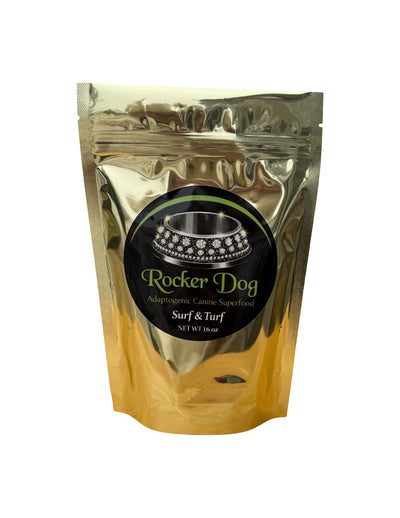 A gold 16 oz. resealable bag of Rocker Dog's Surf & Turf dog food which contains chunks of ground beef, organic sweet potatoes, organic parsley, and organic blackberries.